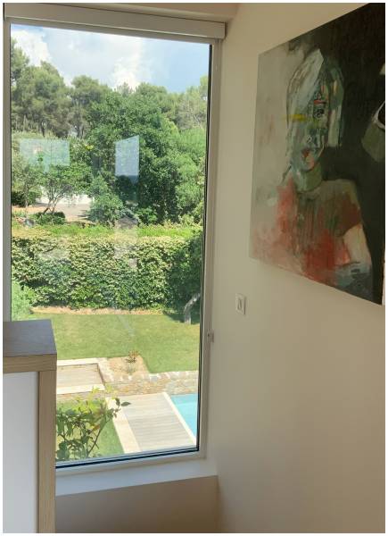 Création d'une piscine à débordement en pierre et avec des murets de pierres sèches à Bouc bel air dans le Sud de la France