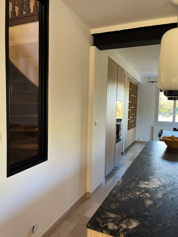 Rénovation intérieure cuisine et salon : comment créer un espace plus ouvert et chaleureux ?